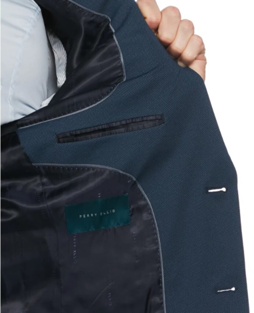 a person holding a Suit Jacket